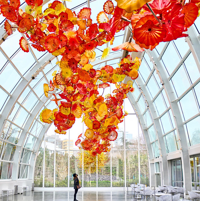 The pale Seattle sky really isolates the vibrant colors of this Chihuly installation. #Pale