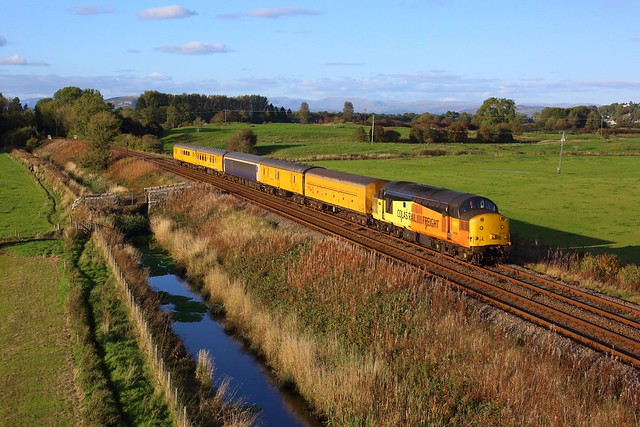 37116 leading the 3Q88 Carnforth to Carlisle via Sellafield and Shap at Black Dyke, Arnside on 15 October 2021.