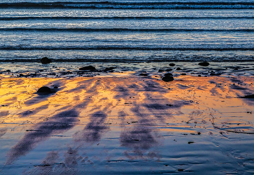 reflection beach ocean sunset scenery purple water patterns nature oregon oregoncoast sand orange wet