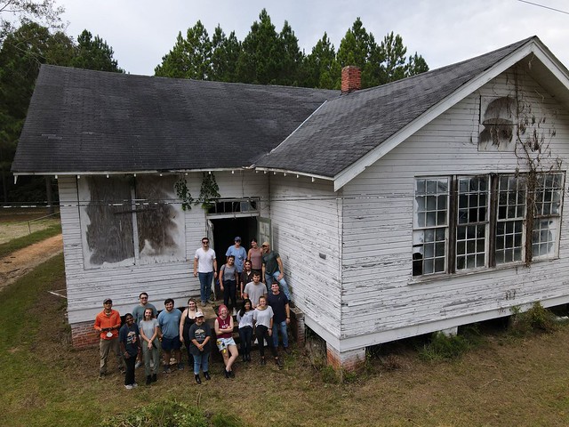 A group of people outside the Tankersley School in Montgomery County.