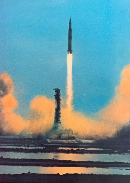 “Apollo 11 Liftoff.”  Postcard CC25905 from Official NASA Film. Color by Mike Roberts.