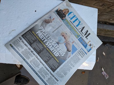 Newspaper on street