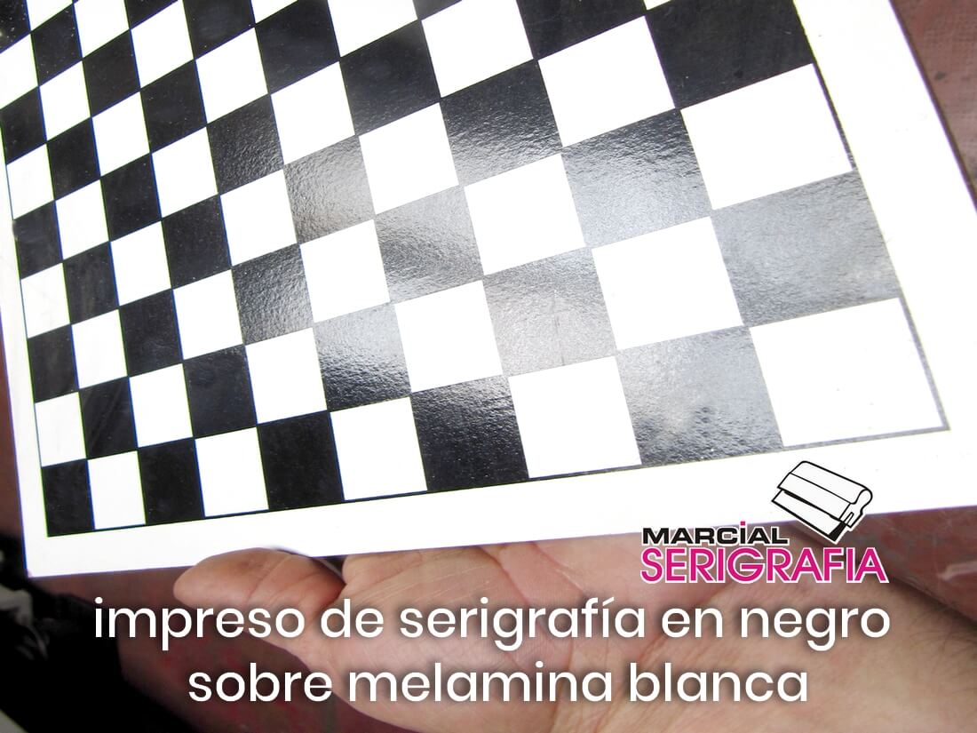 White melamine with MDF/Fibrofácil base. Screen printed in 1 color black. Checkers/Chess Board