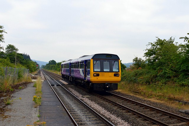 Pacer 142028 approaches Bamford station with the 2S81 Sheffield to Manchester Piccadilly, 12th July 2018.