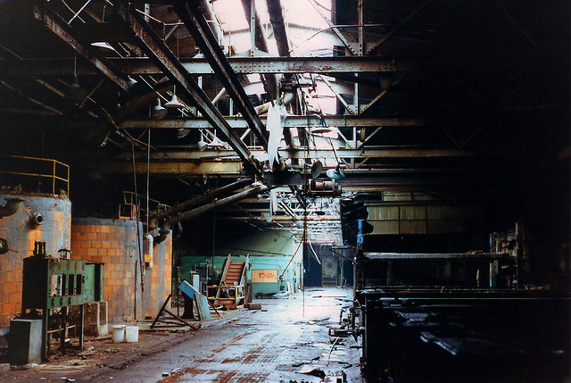 Deep inside the Robert Gair paper plant. The stagnant air reeked of rust, grease, mold and disuse. An occasional drip of water echoed somewhere in the distance. Today, multimillion dollar townhouses occupy this exact space. Piermont NY. Feb 1987