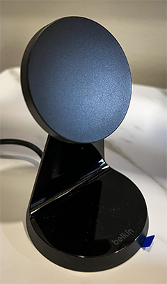 The wireless charger stand is available in black or white.