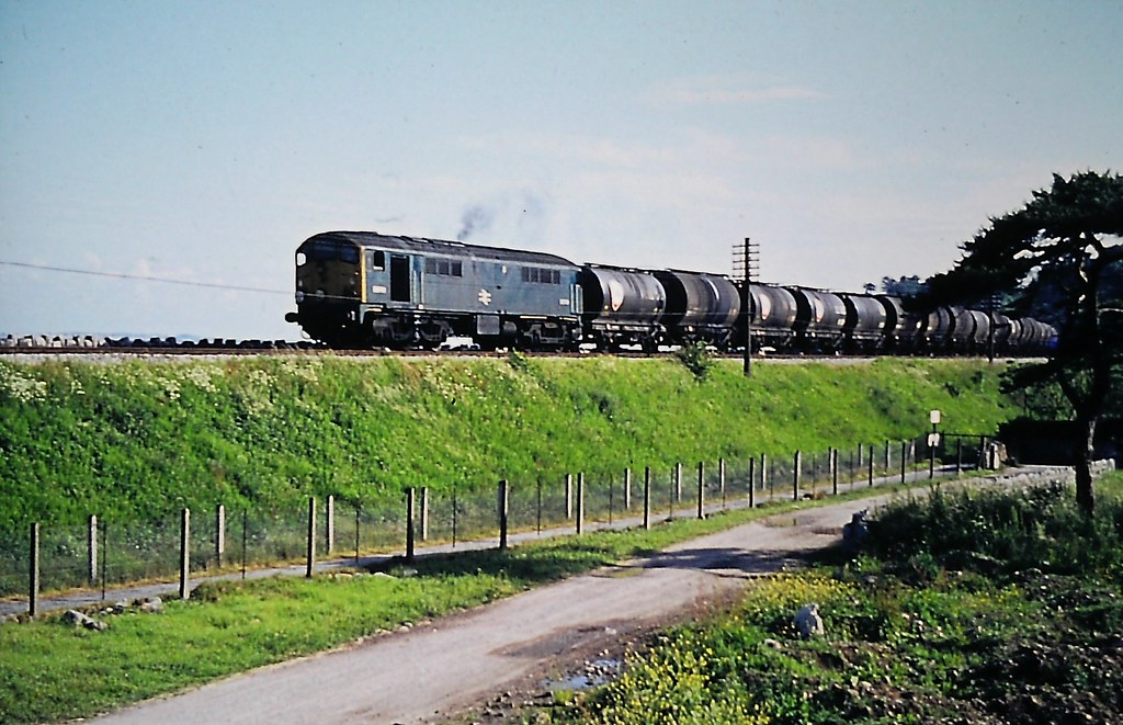 BR Class 28, Metropolitan-Vickers Co-Bo D5701 passing Grange-over-Sands in June 1968 on a train of oil tanks