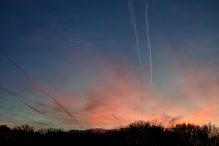Contrails and crepuscular rays