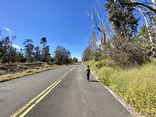 My son walking Crater Rim Road