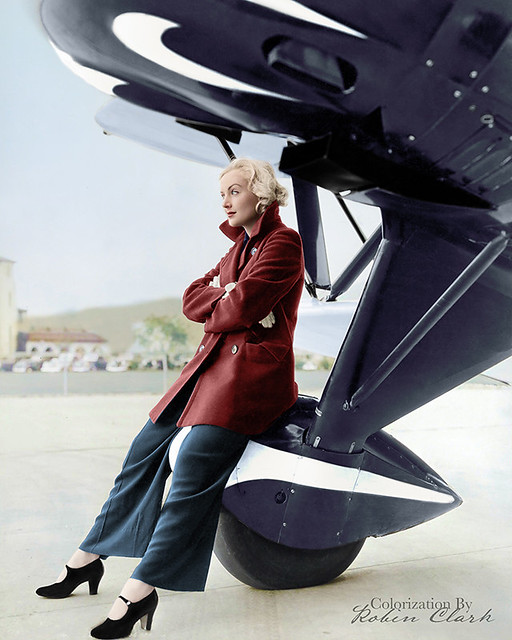 Here’s an absolutely gorgeous photograph of Carol Lombard straddling the landing gear of a 1935 Waco CJC. Andy Heins reports Carol was a pilot.