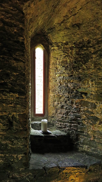 A narrow window in the 11th century Manorbier Castle in Wales