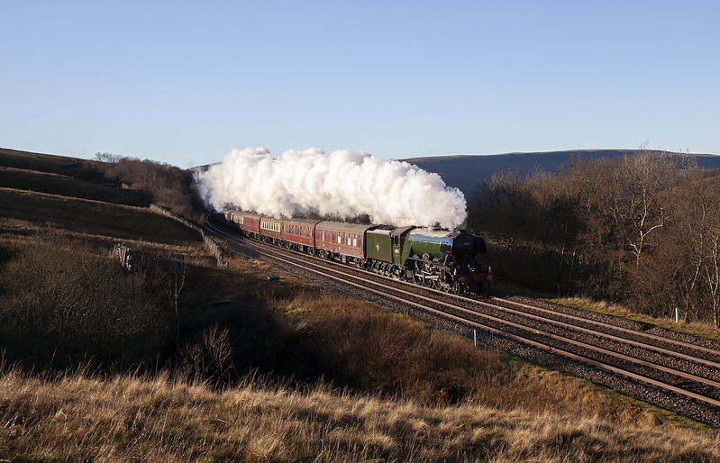 A3 Pacific No.60103 'Flying Scotsman' heads for Carlisle with a Christmas Special originating from Liverpool past the site where the water troughs once stood in Garsdale.
