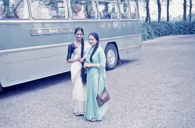 Two ladies and tour bus
