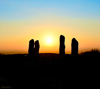 Four standing stones at sunset. 19