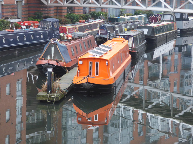 Orange narrowboat on the Oozells Street Loop at Ladywood Junction
