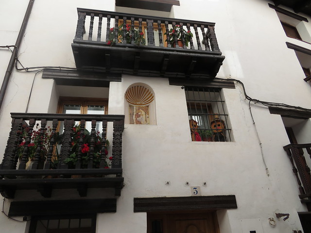 Wooden balconies and a little niche,   Linares  de Mora,  Teruel, Aragon,  Spain