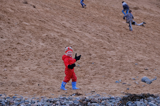 Molly was quite delighted with the older children rolling down the sand dunes. 