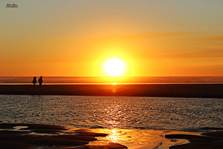 a walk along the beach at sunset....