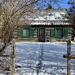 An old log house at 305 St Patrick St, Merrickville