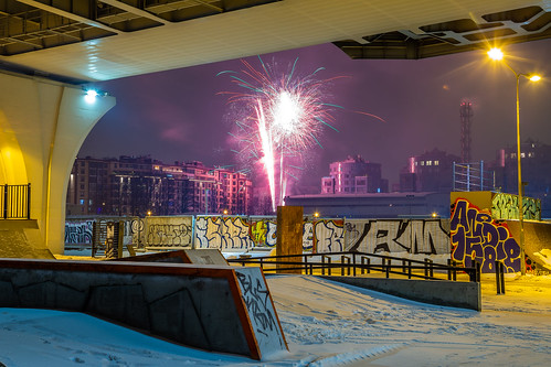 fireworks night bridge buildings srchitecture graffity sky lights view city urban pillars