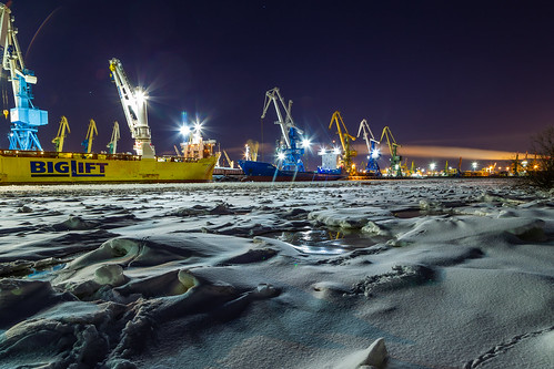 winter night port ice water sky steam ships view city urban coast lights seaport cranes