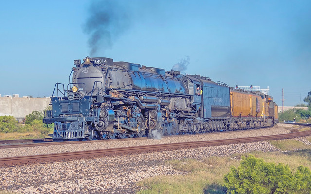Union Pacific 4-8-8-4 Big Boy steam locomotive 4014 departs from Tucson, Arizona, on the morning of October 19, 2019, and passes through the curve at Milepost 988 on the Sunset Route
