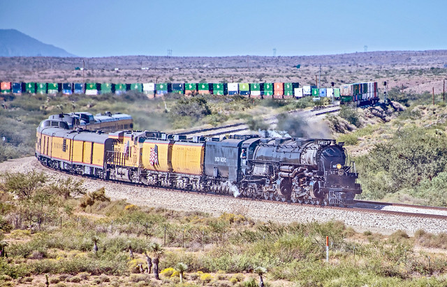 Union Pacific 4-8-8-4 Big Boy 4014 leads its train through an S-curve on the Sunset Route between Willcox and Bowie, in Cochise County, Arizona, on a bright October 19, 2019, afternoon.
