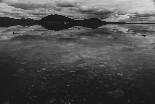 timaukel magallanesylaantárticachile chile kiltro tierradelfuego lagoblanco patagonia lake dark landscape water reflection sky clouds island nature bw blackandwhite rocks mirror montains