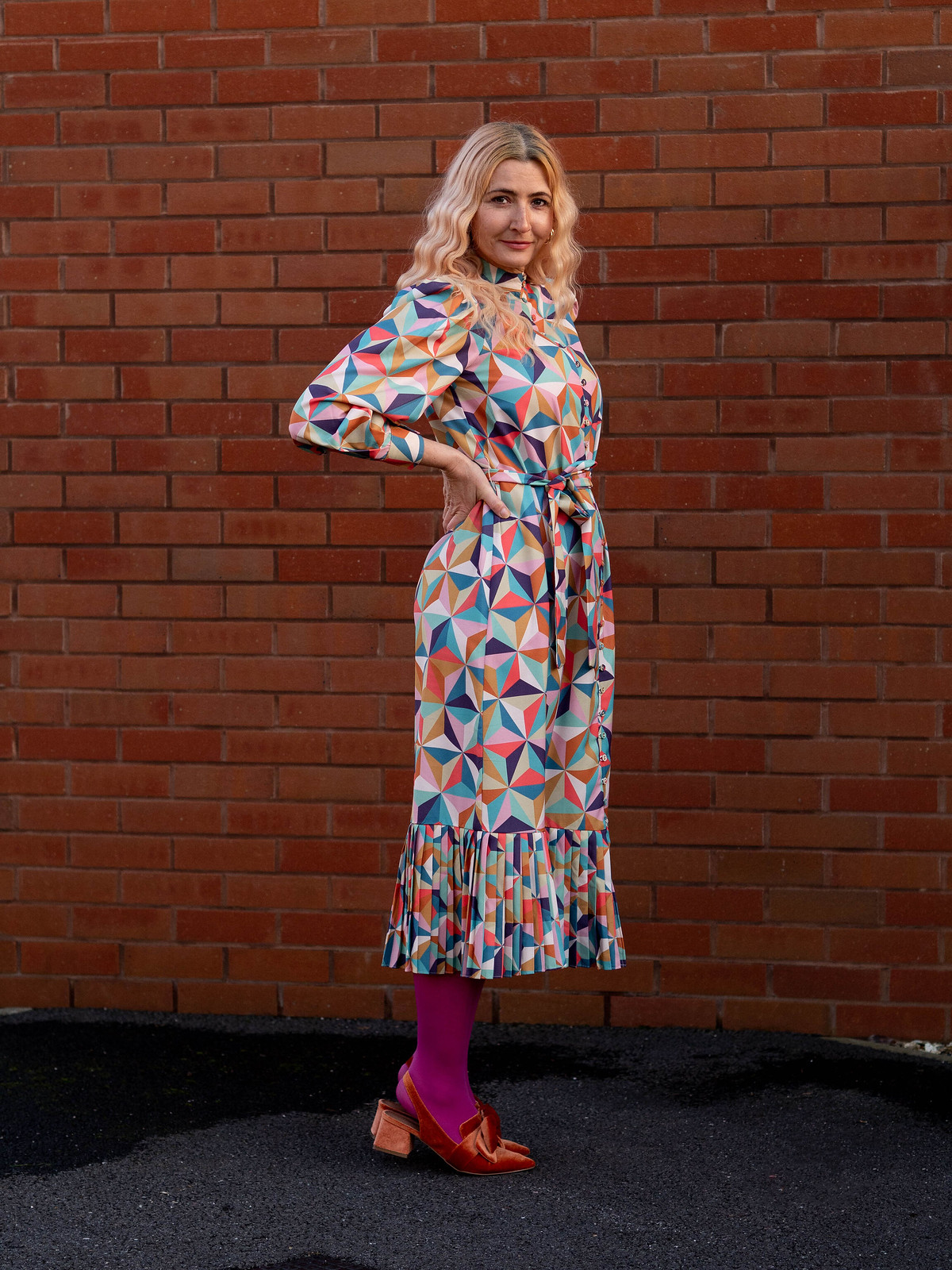 The Catheriniest Dress of All Time: Catherine Summers of Not Dressed As Lamb wearing a multi-coloured Raishma Studio maxi dress, pink tights and orange bow slingback heels | Over 40 Fashion and Style