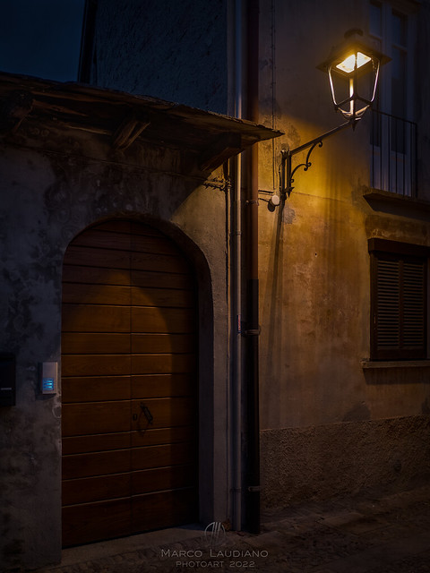At night, through the alleys of Cannobio, Book VIII