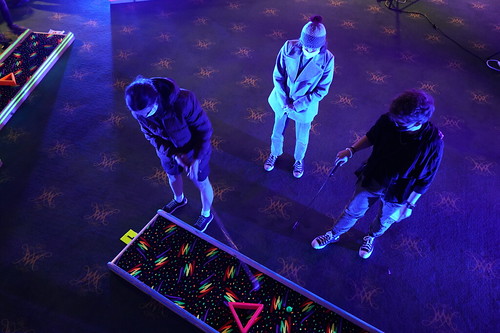 Glow-in-the-dark mini-golf was one of the elements at AMP's Glow Up!
