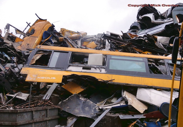 The rigidity of the side of 2009 Scania Omnilink Keolis 2831 is shown here on the scrap heap with even a window intact