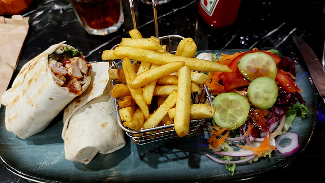 Mexican Spicey Chicken Wrap with Fries & Salad.