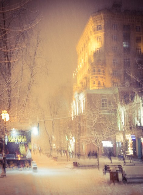 Blurred street on a snowy evening