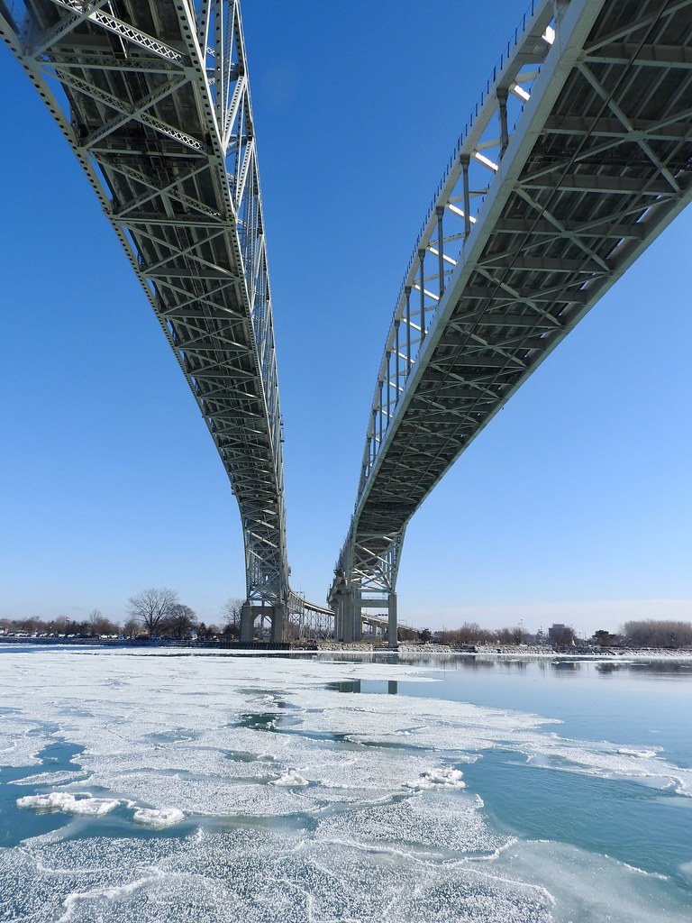 The Blue Water Bridge in Port Huron, Michigan. Photo by howderfamily.com; (CC BY-NC-SA 2.0)