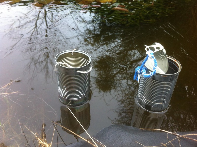 Patent pending on my "melt holes in pond ice" old tin cans invention