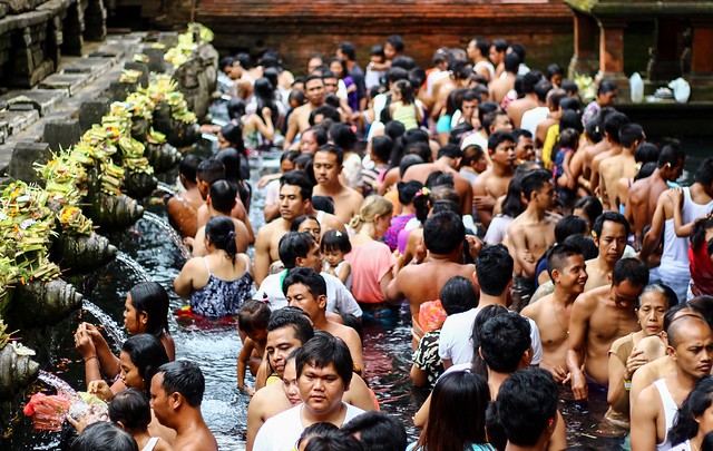 Balinese Hindu participating in a holy bathing ritual at pura Tirta Empul Tampaksiring Bali, Indonesia