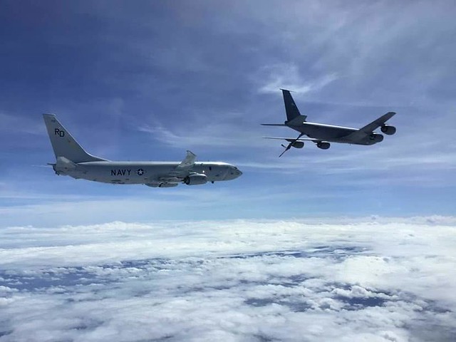 A P-8A Poseidon from VP-47 refuels from a U.S. Air Force tanker from the 506th Expeditionary Air Refueling Squadron during exercise Sea Dragon 2022.