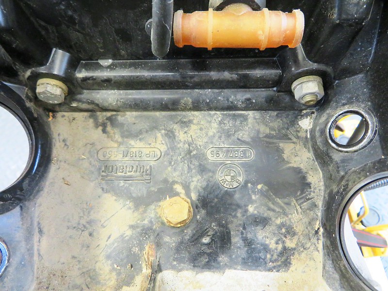 Bolts *Left and Middle) And Nut (Right) That Secure Air Box To Top Of Transmission