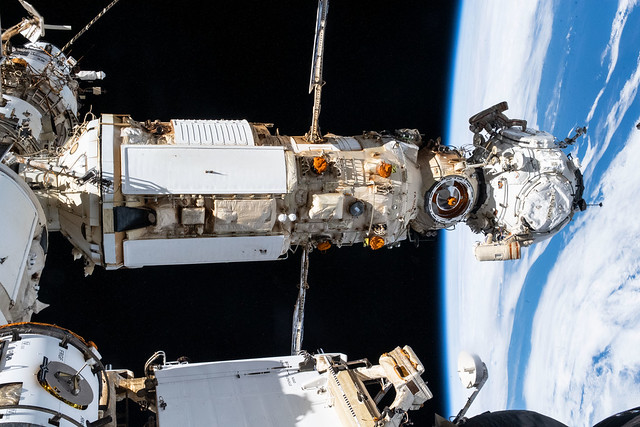 Russian Spacewalkers dwarfed by the Nauka and Prichal modules