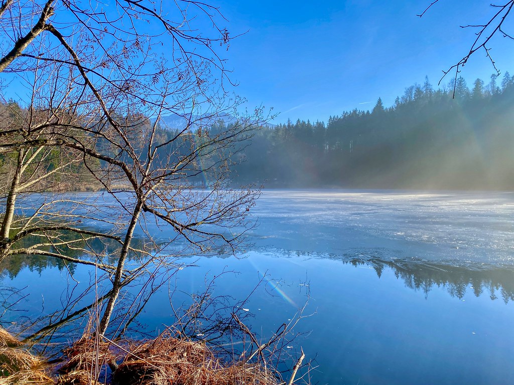 Ice and morning mist on Lake Egelsee in Tyrol, Austria