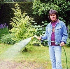 George watering his garden