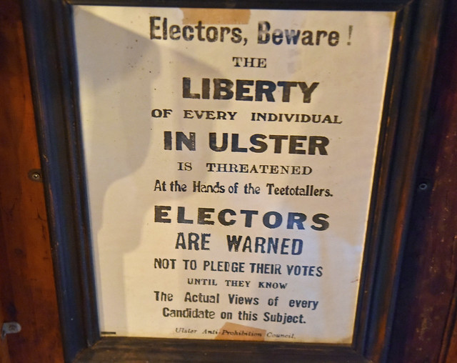 a old poster on a pub wall
