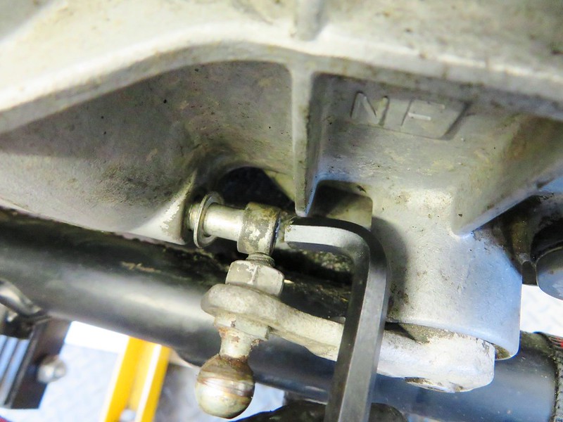 Removing Lower Left Transmission Bolt With Cut-Down 6 mm Allen Wrench