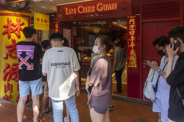 Shoppers queueing outside Lim Chee Guan 'bak kwa' store in Chinatown, Singapore