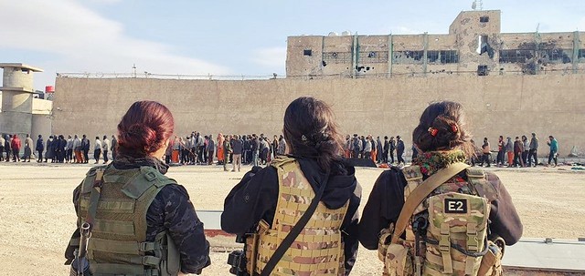 Hasakah, Rojava The Kurdish woman observing the surrender of the biggest terrorist group in the world
