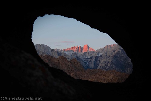 The first rays of sunshine on Mt. Whitney through Window Arch, Alabama Hills National Scenic Area, California
