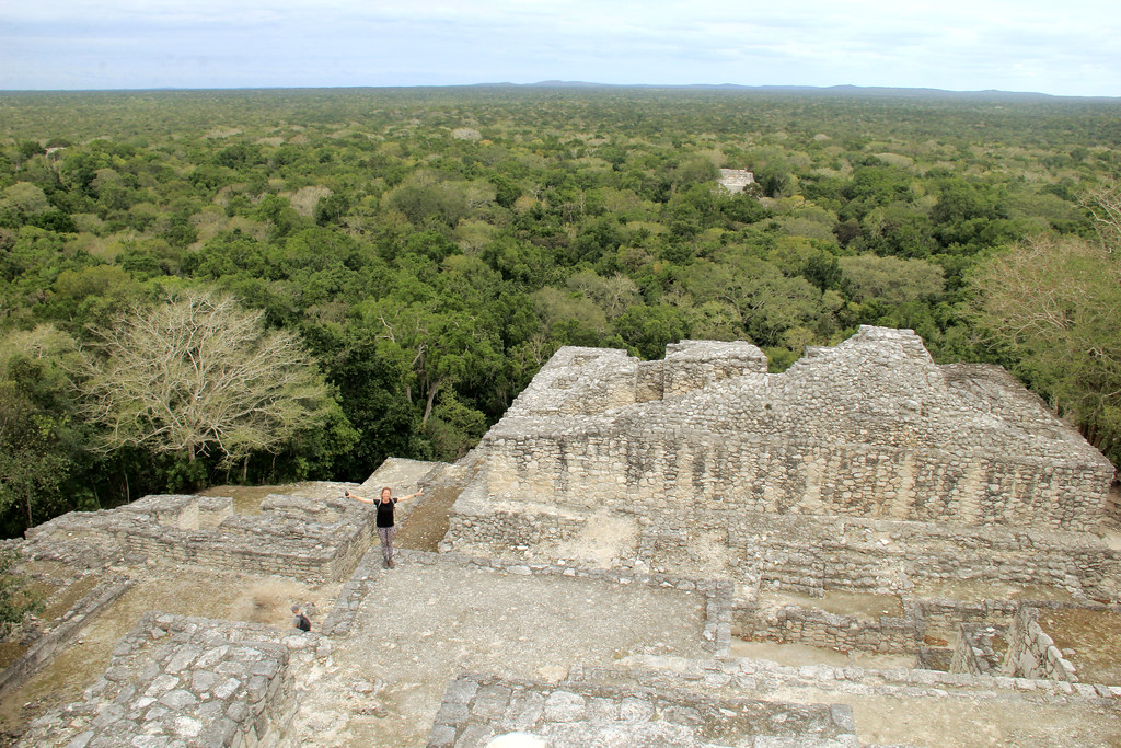 Me posing (almost!) at the top of Calakmul's tallest structure, Yuctan Penninsula, Mexico
