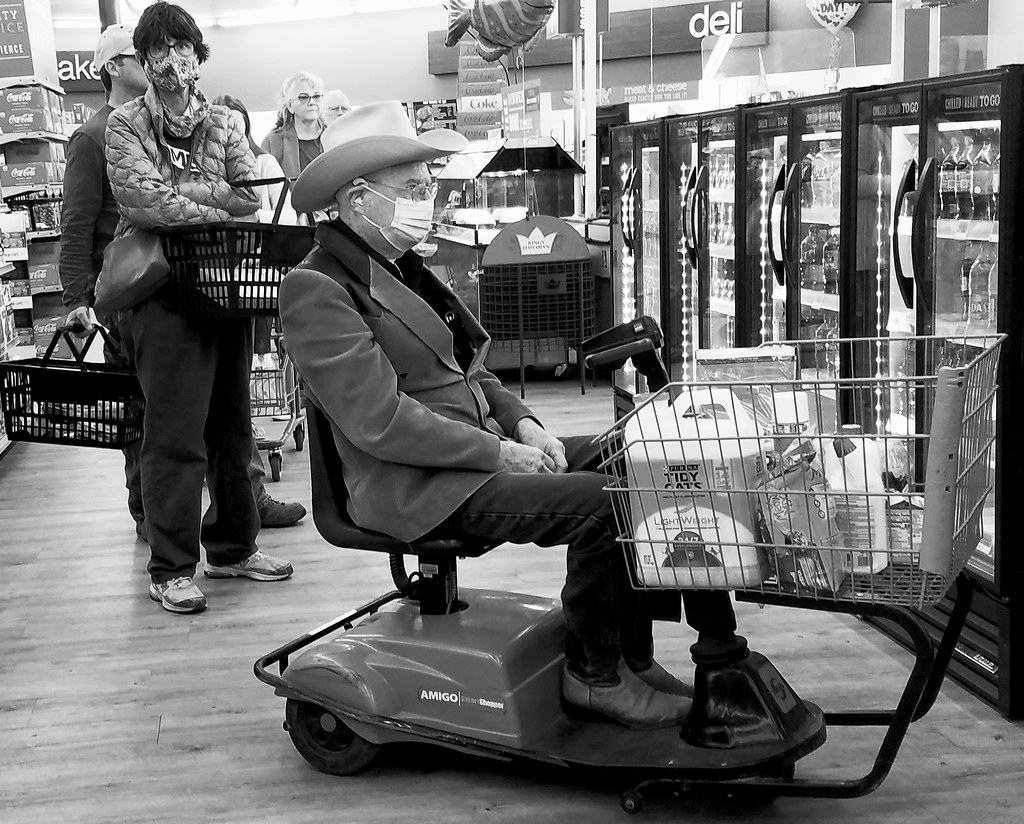Covid-19 chronicles: older man wearing a cowboy hat & a surgical face mask at a supermarket