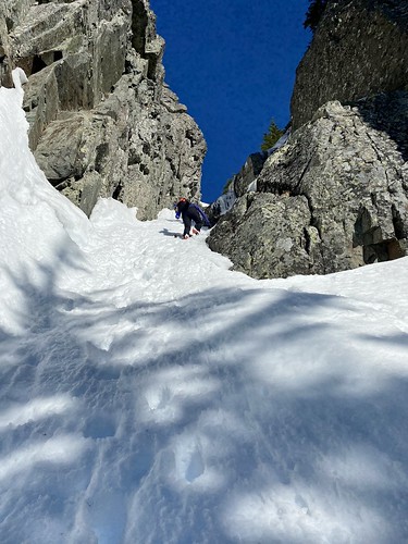 Booting up a couloir on Chikamin Peak